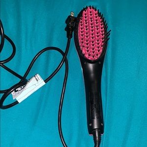 Gently used brush hair straightener